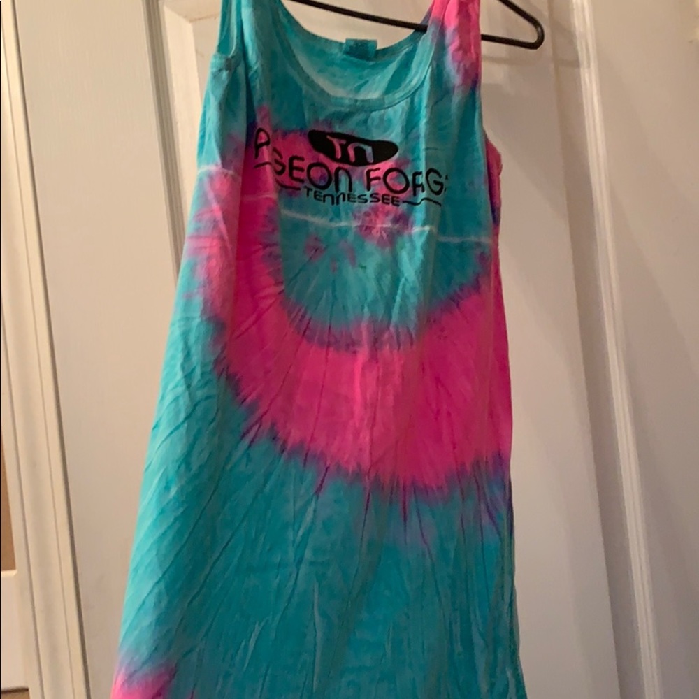 Tie-dye swimsuit cover up has small hole